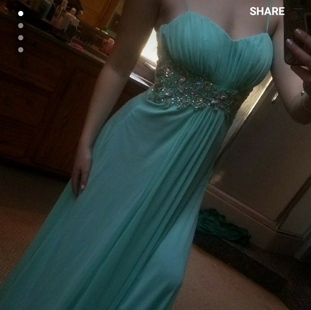 Light minty blue beaded strapped prom dress